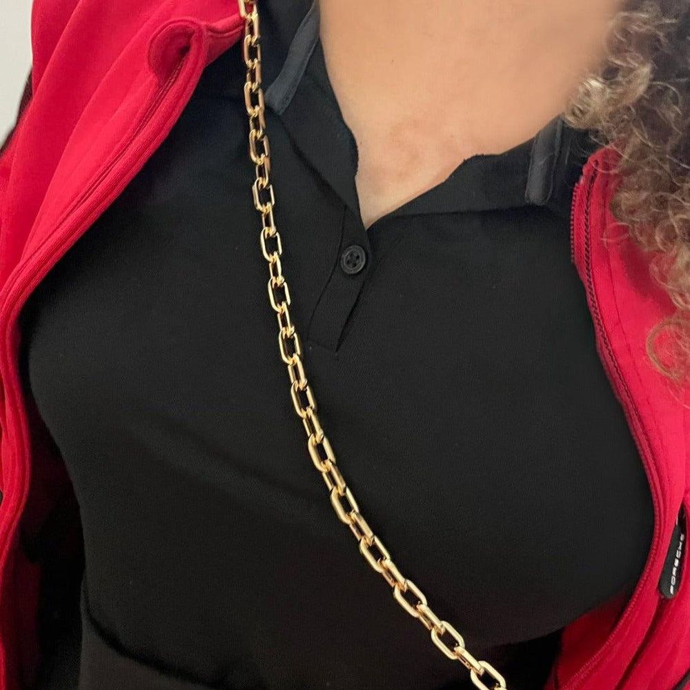 
                  
                    gold-purse-chain-strap-being-worn-on-model
                  
                